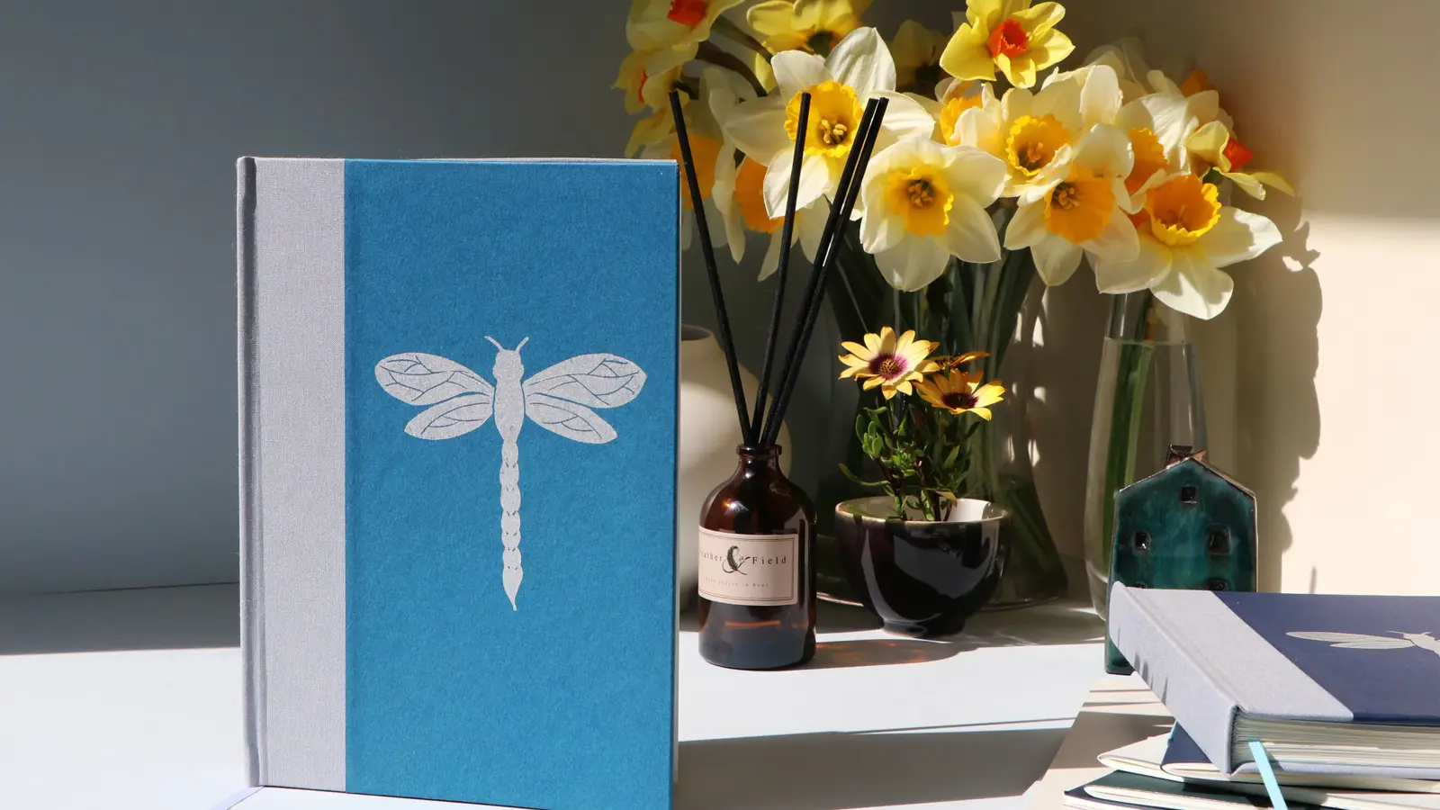 Handprinted teal and silver dragonfly notebook