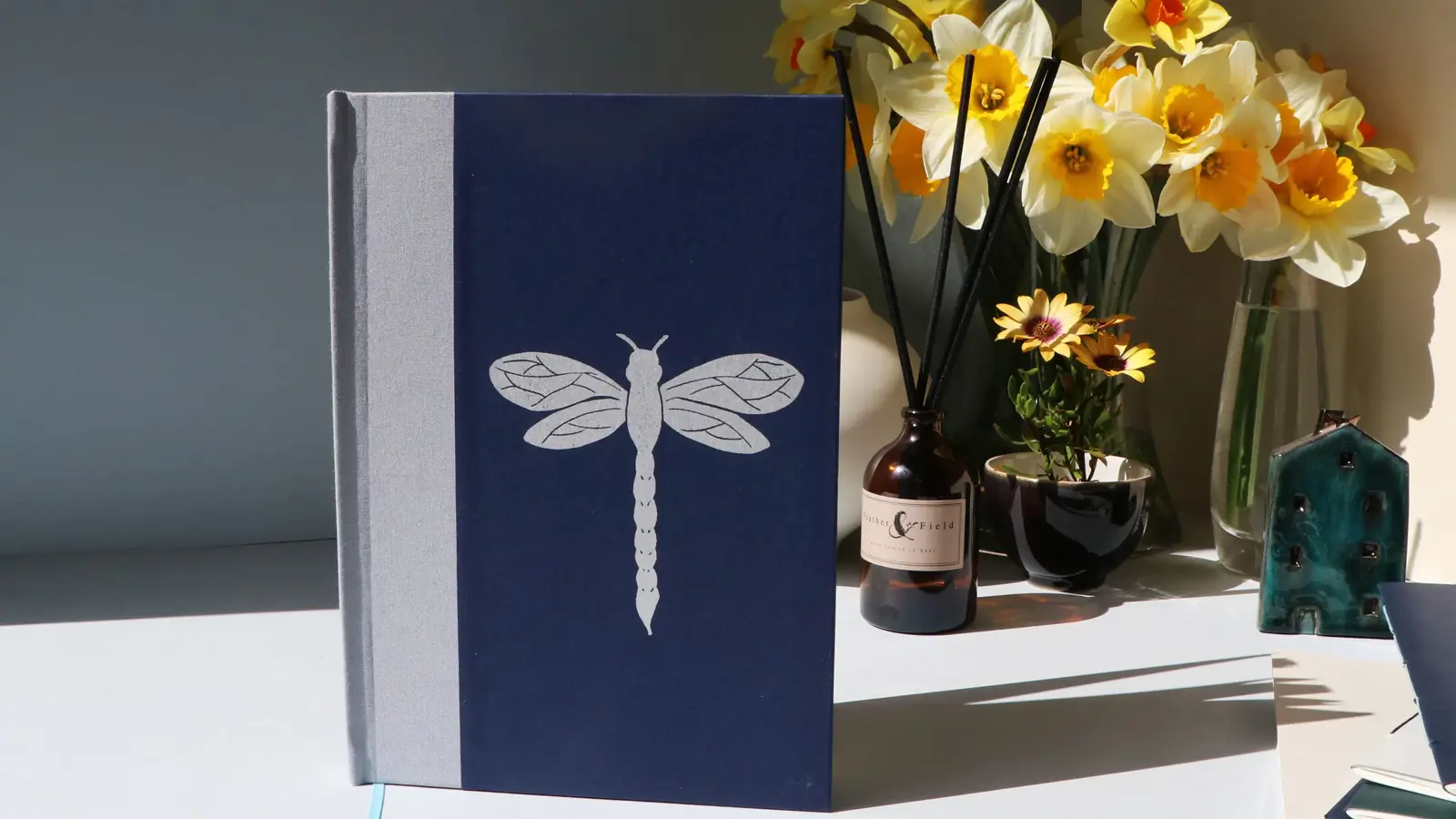 Handprinted blue and silver dragonfly notebook