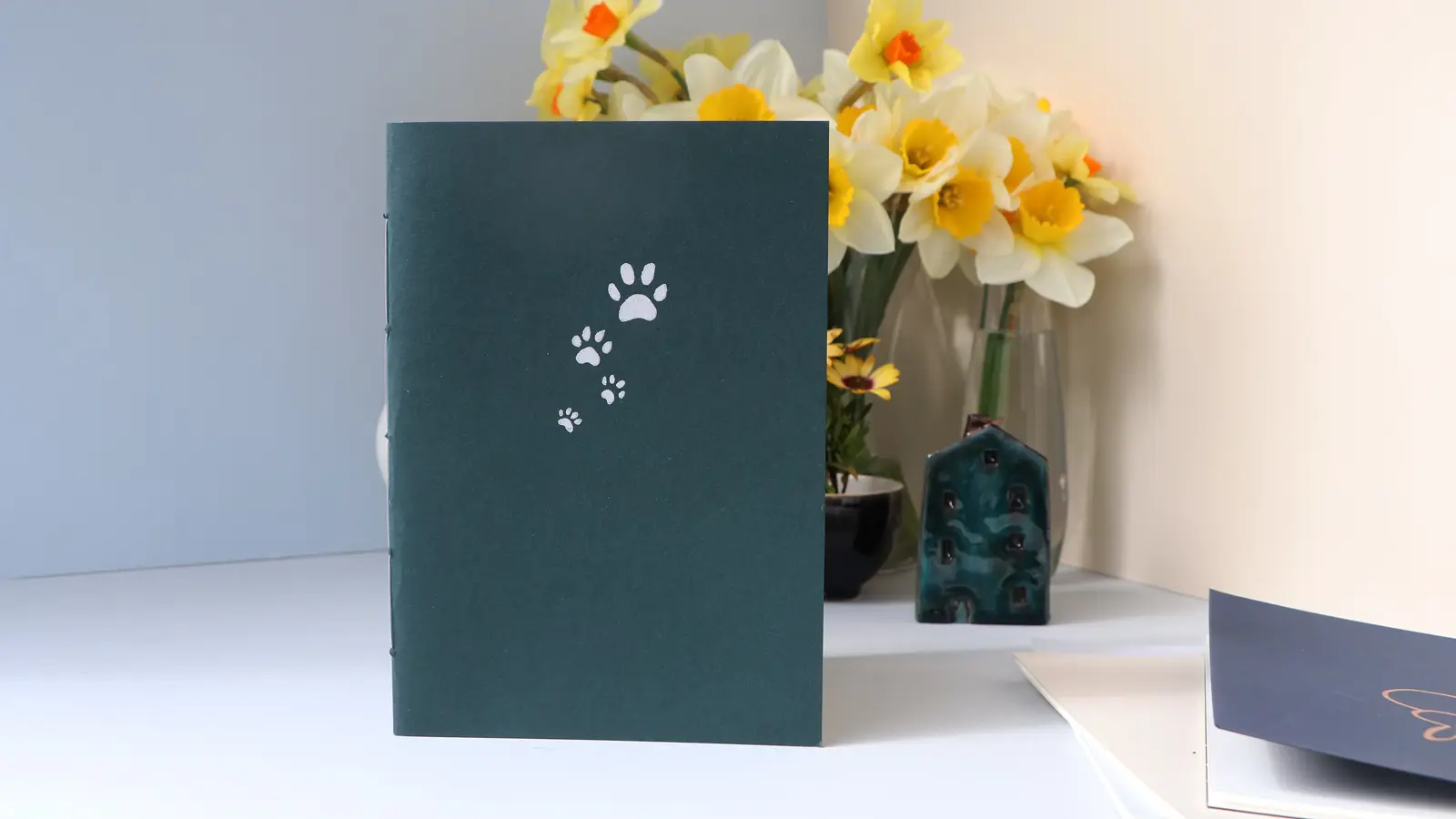 paw print green exercise book