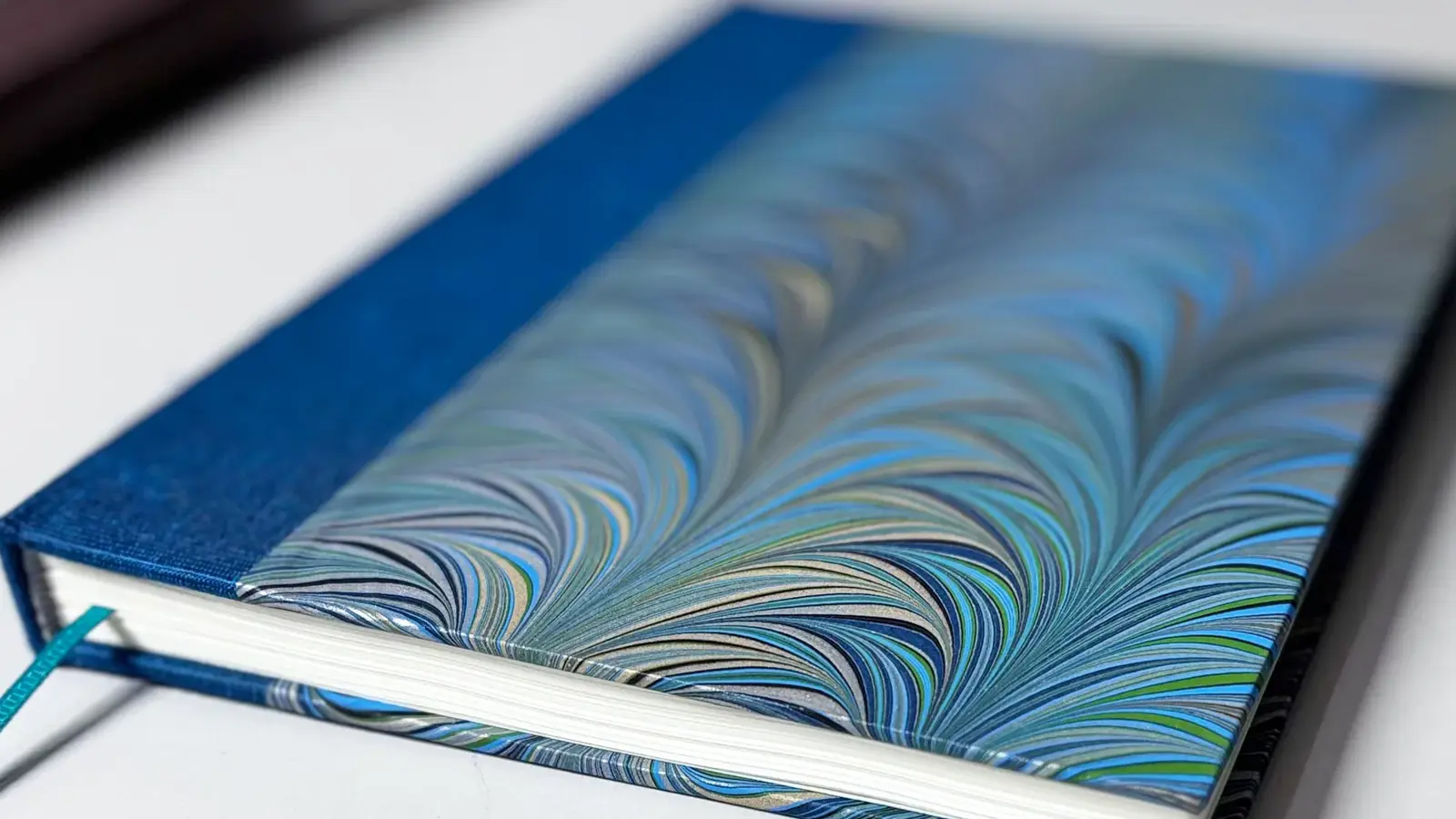 Blue comb marbled notebook