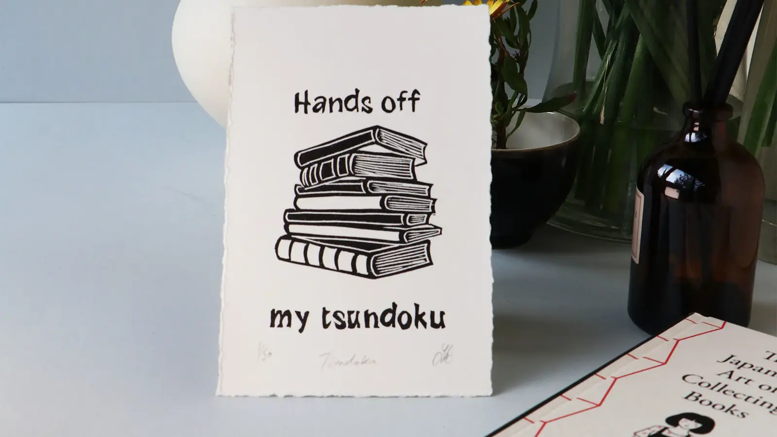 Hands off my tsundoku – limited edition linocut print